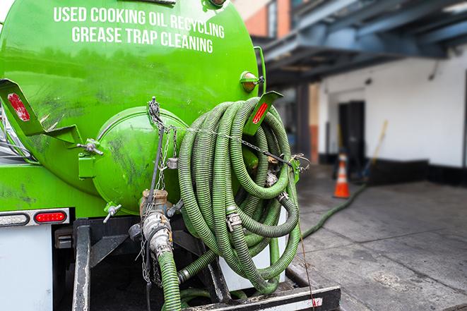 industrial pump clearing a grease trap in Kingman